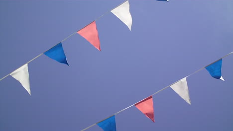 bunting flags wave in the wind - close-up