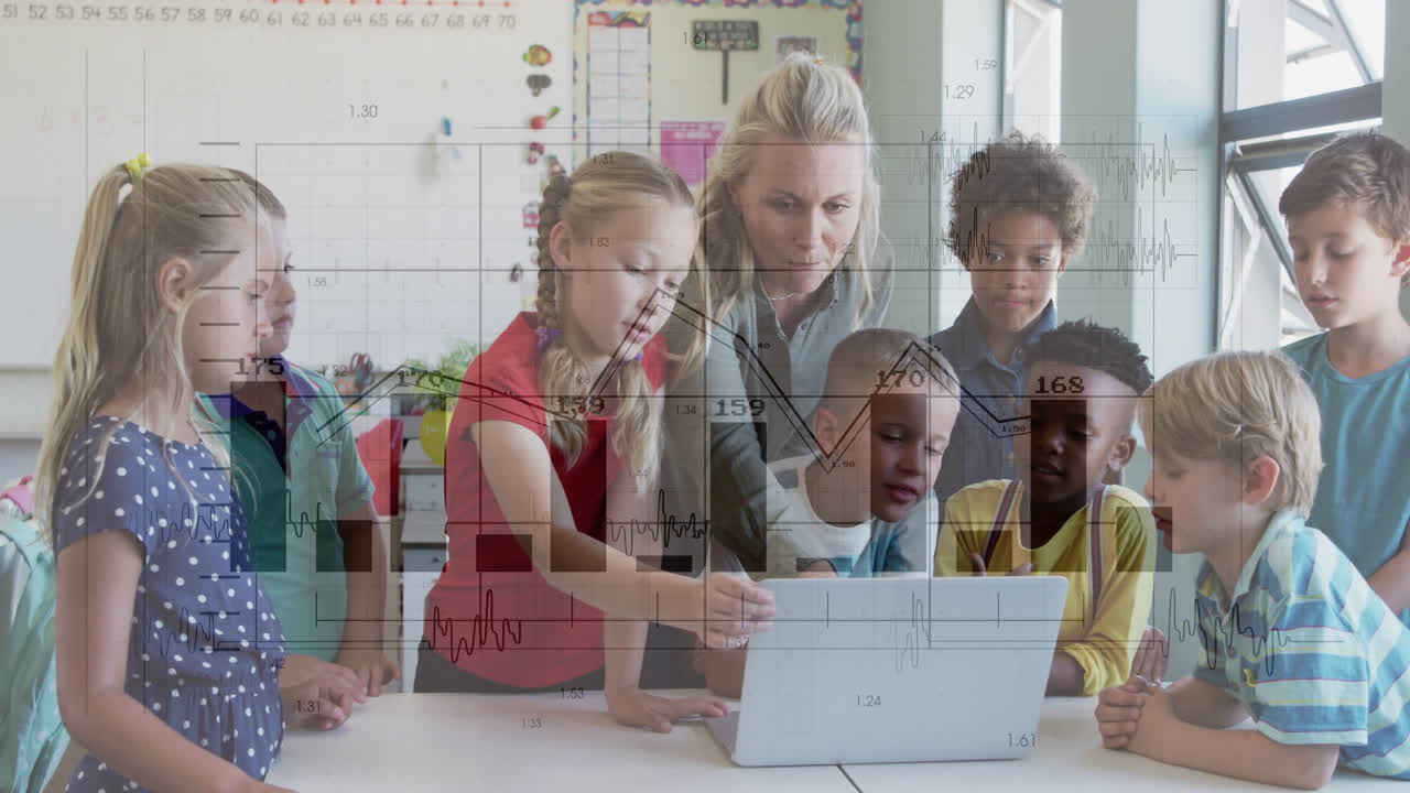 female teacher guiding students around laptop in education classroom, showing animated chart icons