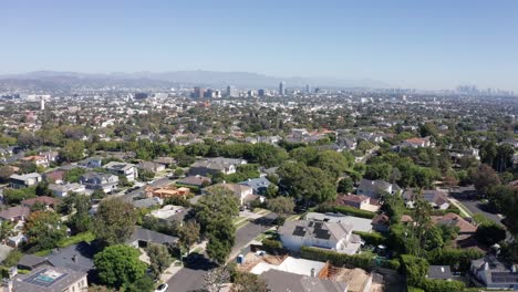 flying above homes in century city, neighborhood of los angeles ca usa on hot sunny day