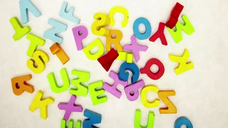 random wooden letters spell out supper cool stop motion loop