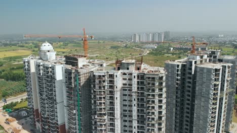 aerial view of the construction of the skyscraper at the outskirt of the city