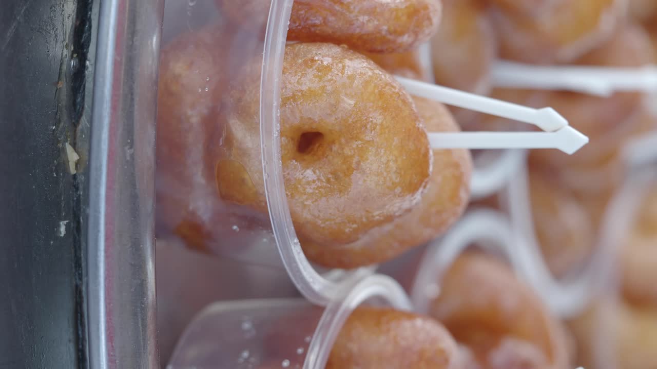 Fried Doughnuts in Plastic Cups