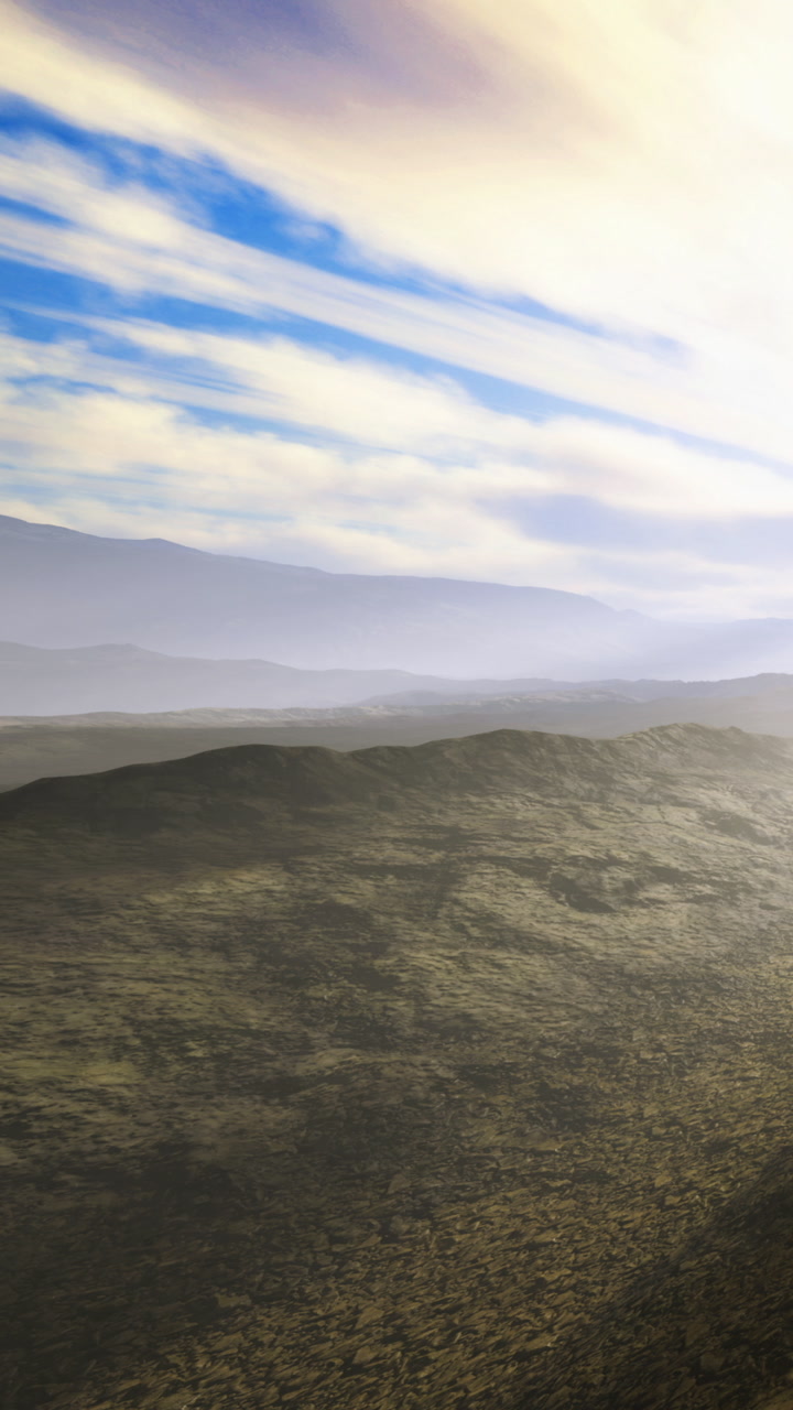 Vast desert landscape awakens as sunlight spills across the horizon