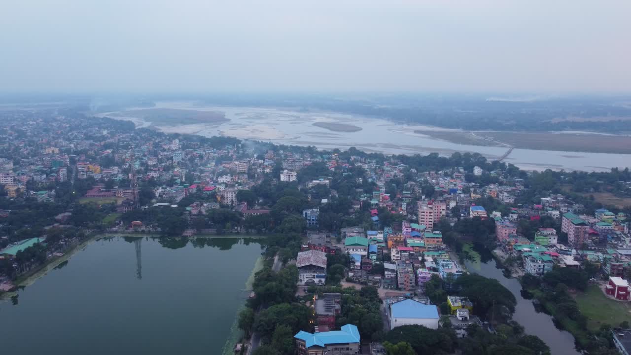 Drone view of Cooch Behar city landscape on the bank of River Torsa on the foothills of Eastern Himalayas, West Bengal