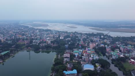 drone view of cooch behar city landscape on the bank of river torsa on the foothills of eastern himalayas, west bengal
