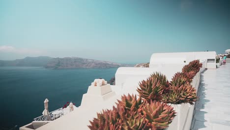 Clip from the top of a Greek Island with the ocean and the local architecture prominent
