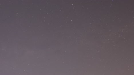 time-lapse of stars moving across the night sky