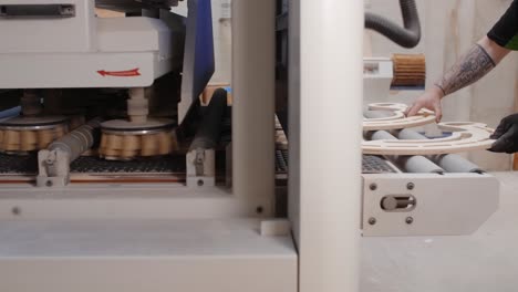 woodworking process:  wood pieces being planed