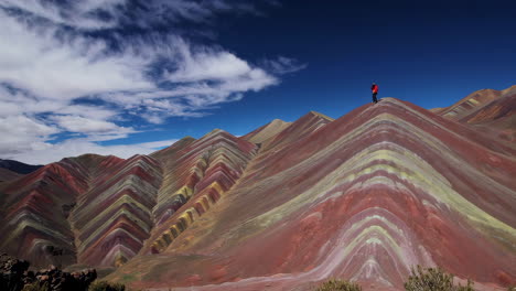 photographer capturing the vibrant rainbow mountains of peru