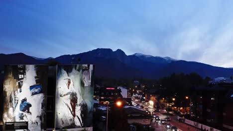 mountain town at dusk with mural