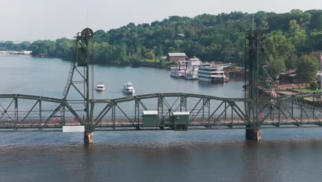 aerial telephoto close-up panning shot of the lift bridge over the st. croix river in stillwater, minnesota. 4k