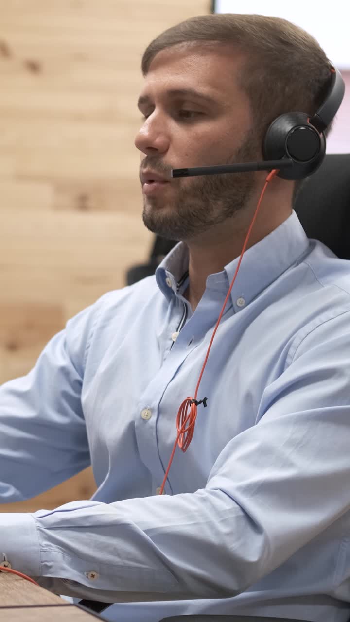 Engaging telemarketer communicating with customers over the phone ...