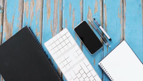 diary, keyboard, smartphone and pens