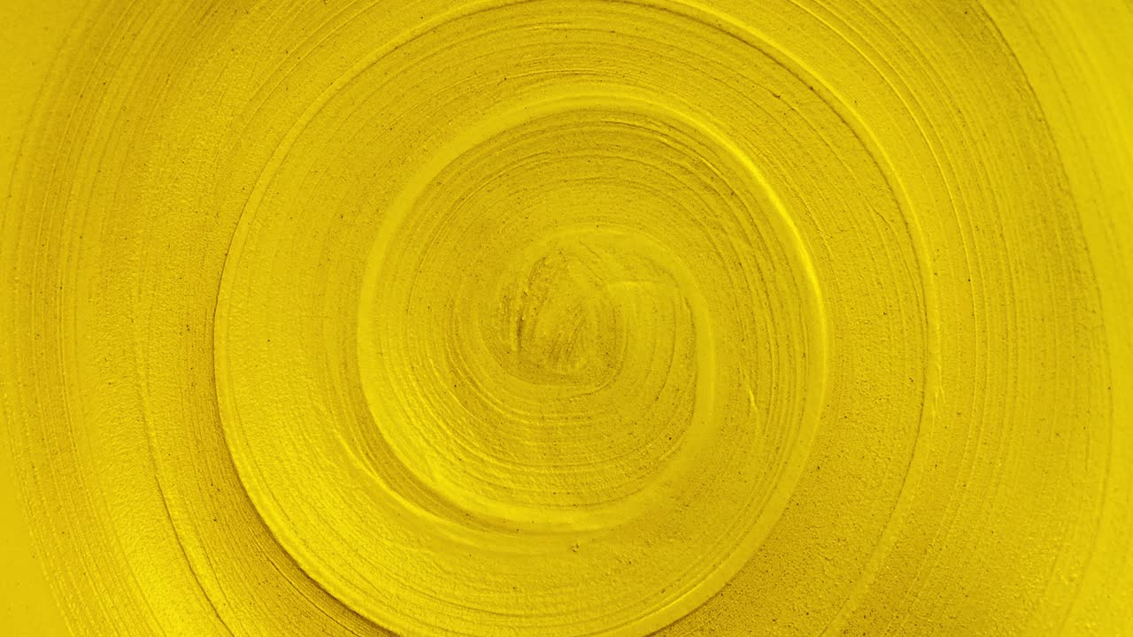 close-up view seamless looping rotation of spiral lines. trendy golden color and abstract background of infinity for copy space