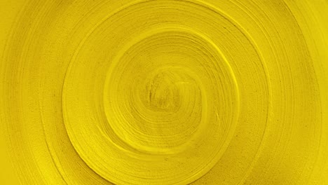 close-up view seamless looping rotation of spiral lines. trendy golden color and abstract background of infinity for copy space