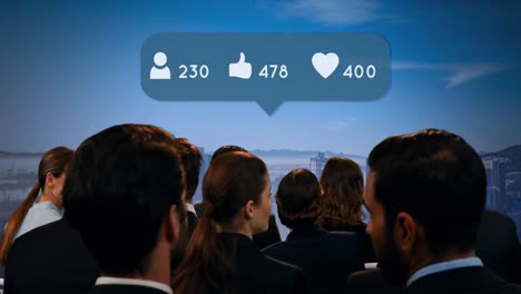 animation of speech bubble with social media icons over business people talking and cityscape