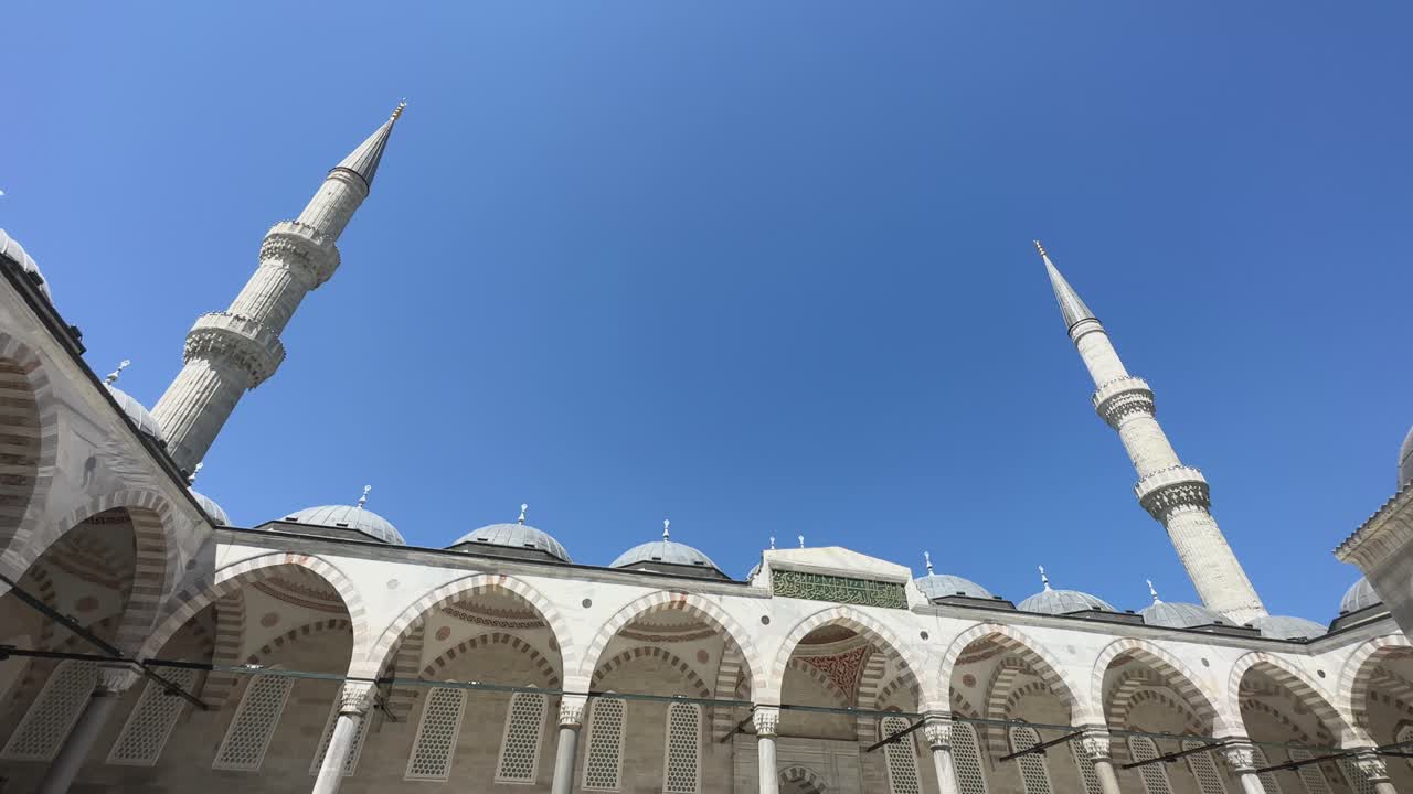 Suleymaniye Mosque center courtyard grand arches and rounded ceilings
