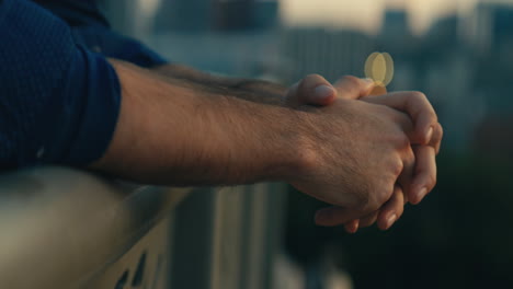contemplative man on a rooftop