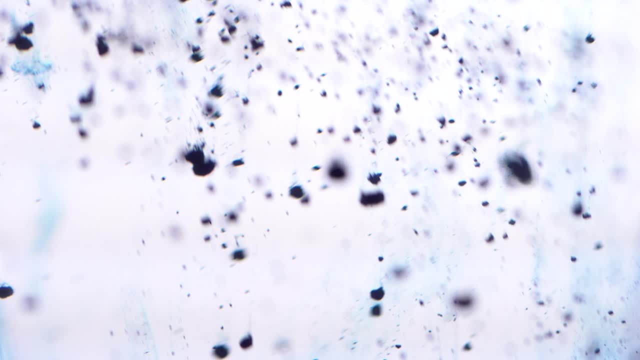 partículas de tinta azul abstracta