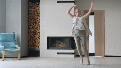 woman dancing in a modern living room