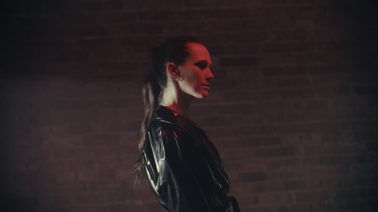 Woman in Leather Jacket, Red Light Studio Portrait