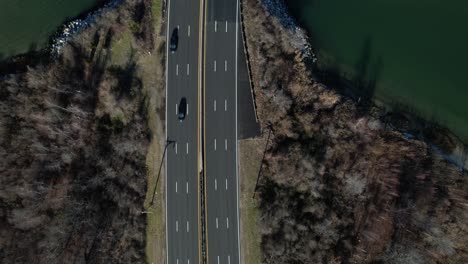 an aerial view over a highway on long island, ny on a sunny day