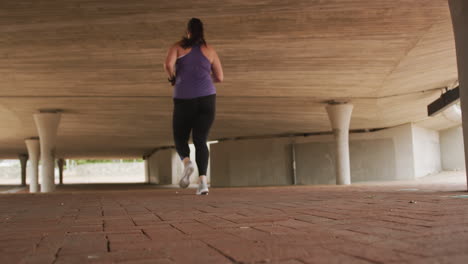 young caucasian woman running