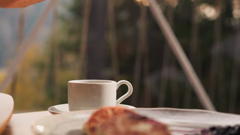 coffee and pancakes in the forest