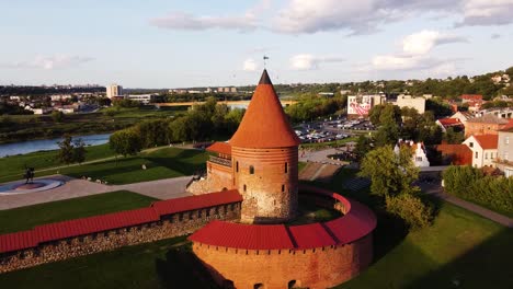 Aerial-footage-of-Kaunas-castle,-situated-in-Kaunas-old-town,-Lithuania-in-beautiful-sunny-evening