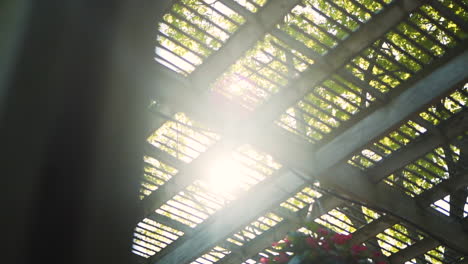 Sun-shining-through-a-gazebo-in-a-park