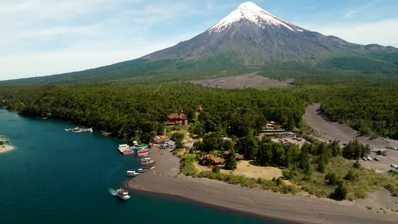 Aerial View of a Volcano, Lake, and Forest