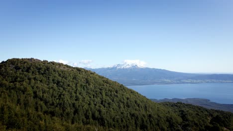 Flying-Over-Greenery-Valley-Near-Volcan-Calbuco-In-Puerto-Varas,-Los-Lagos,-Chile