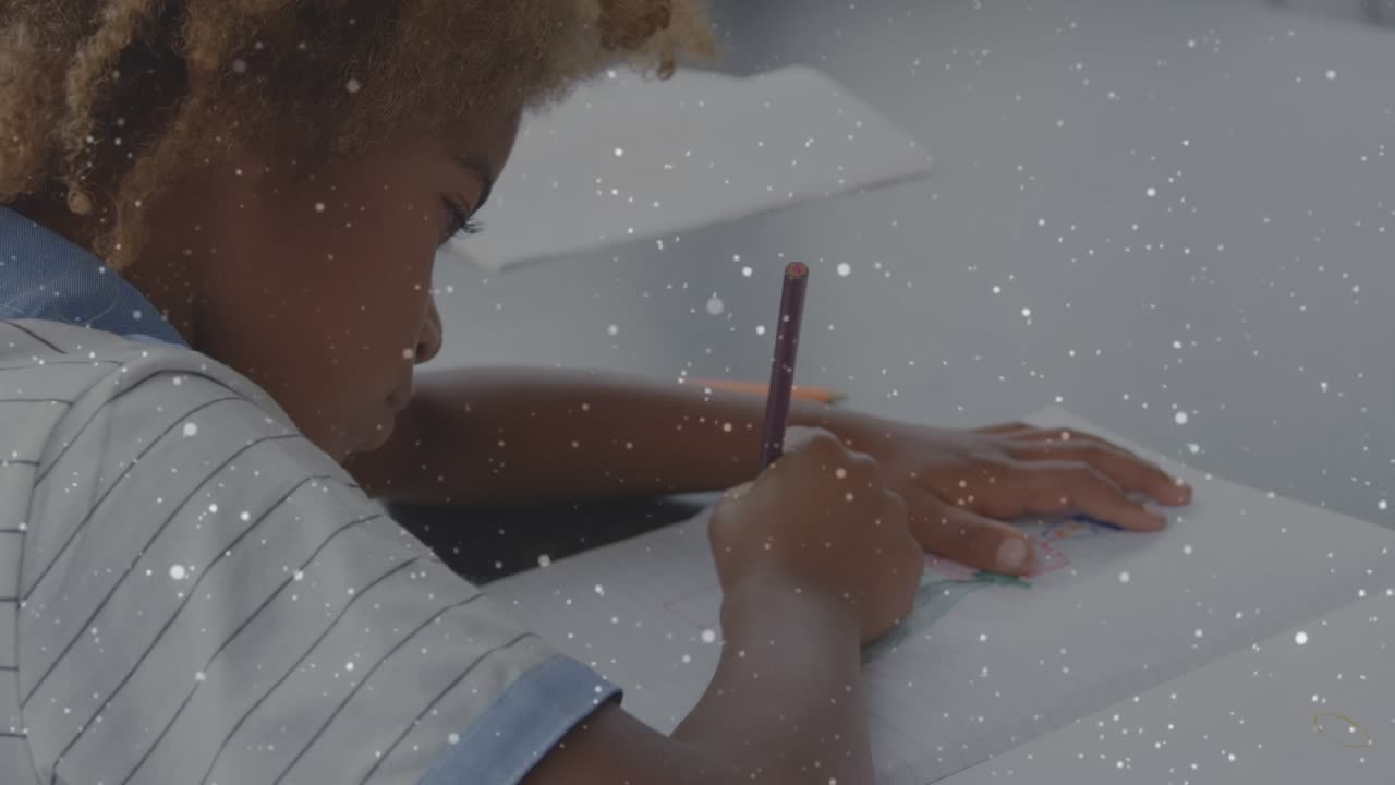Animation of spots over african american schoolboy writing