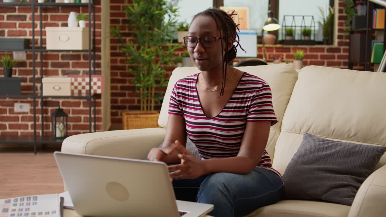 Woman using laptop at home