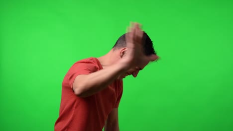 Man laughing out loud. With a red shirt.