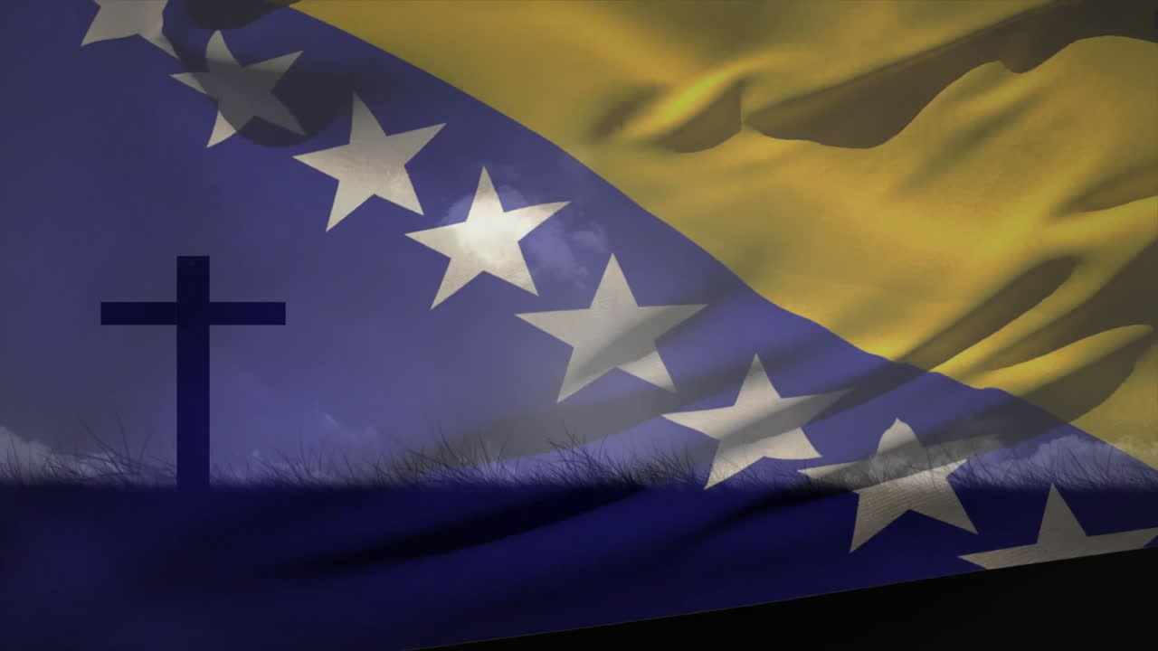 Cross silhouette against cloudy sky with Bosnia and Herzegovina flag waving
