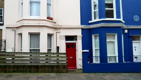 Colorful-Victorian-houses-in-Portobello-Road,-Notting-Hill-in-London,-UK