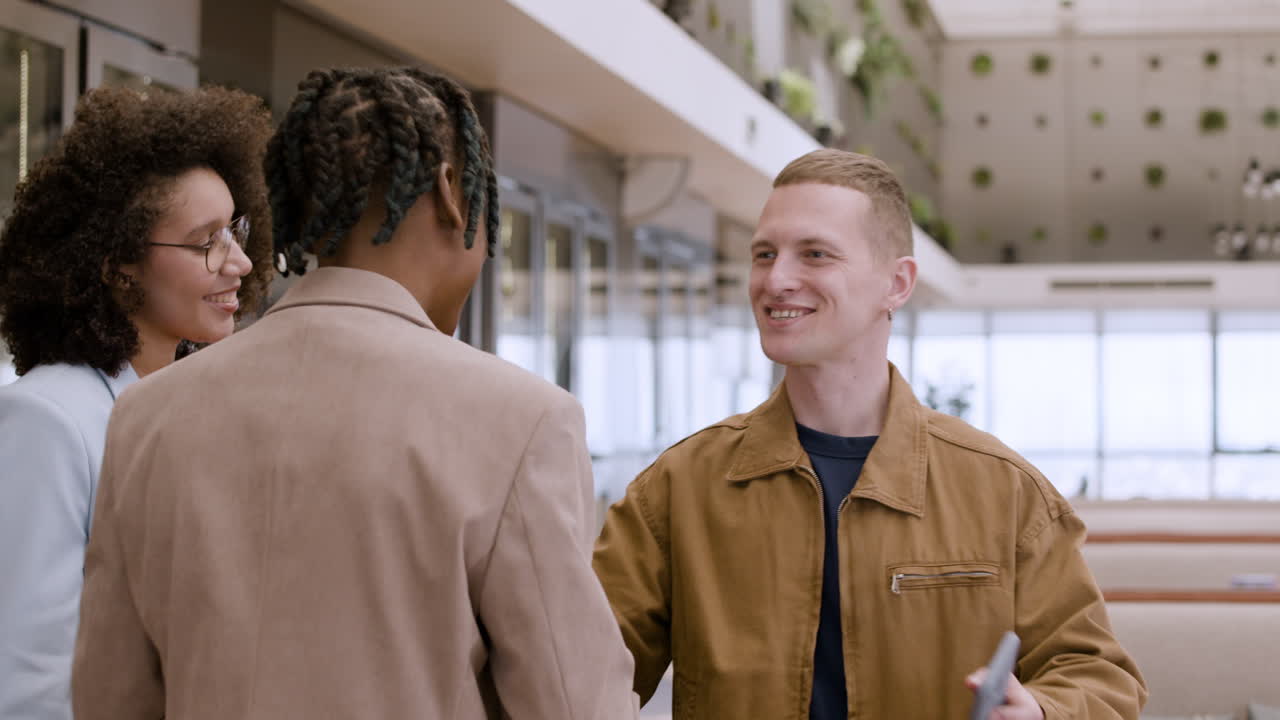 People Relaxing and Socializing in a Modern Cafe