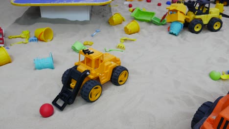 kids toys in a sandbox