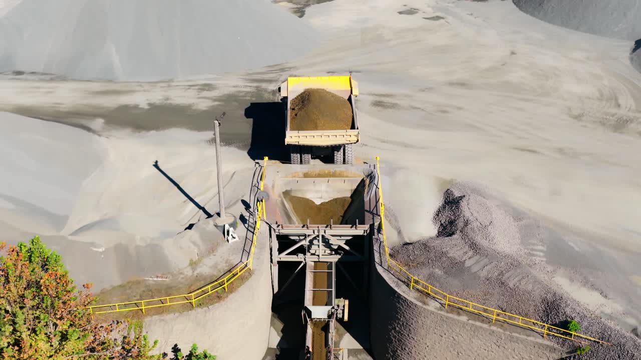 Heavy Duty Mining Machine To Break Down Raw Materials At Martin Marietta - Jones Mill Quarry In Arkansas, USA. Aerial Pullback Shot