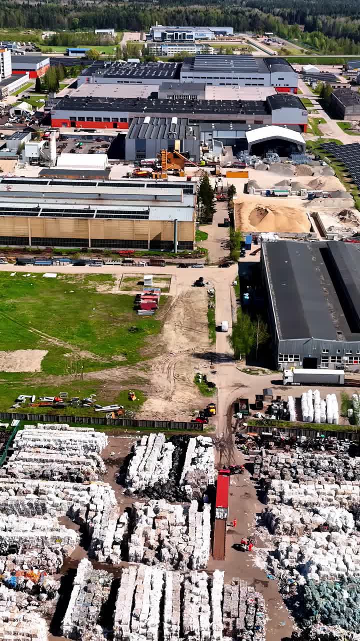 Large recycling and waste plant in Lithuania. Aerial vertical view