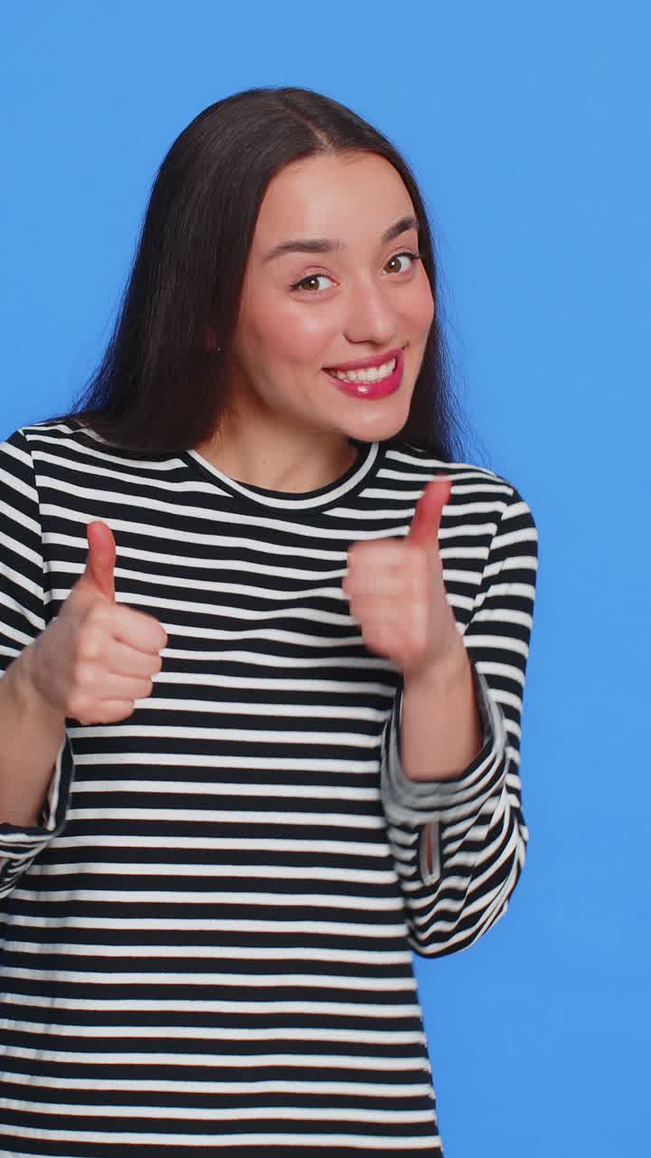 Woman pointing down saying to subscribe gesturing ok and like promotional information below