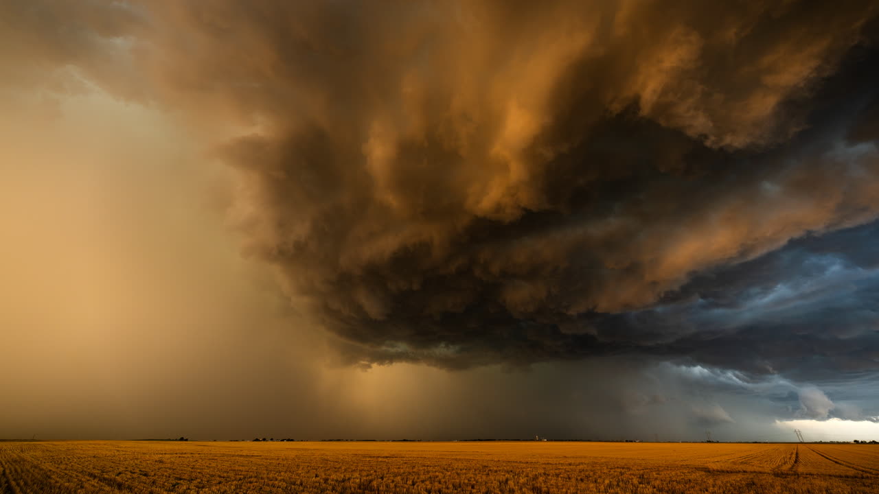 Storm clouds filled with texture and contrast and low angle sunlight color