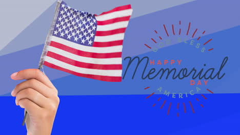 composition of hand holding american flag over happy memorial day text, on blue stripes