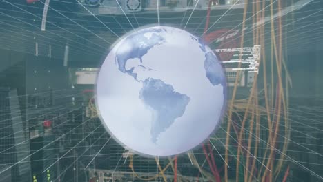 animation of spinning globe and data processing against close up of a computer server