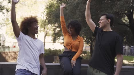 group of diverse friends passing time in park