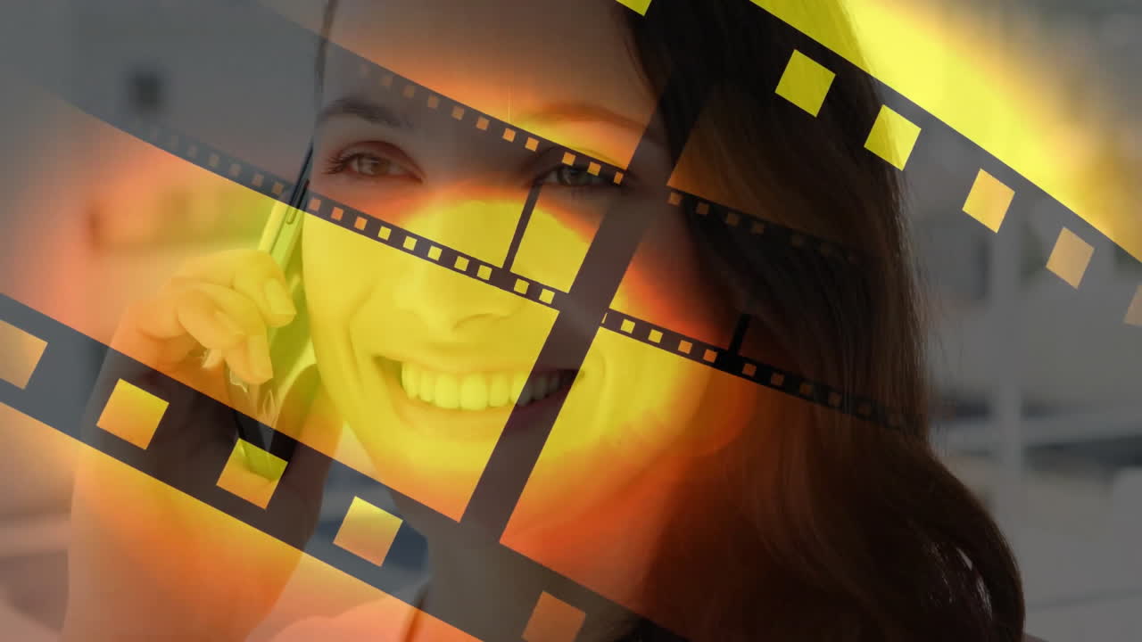 Talking on smartphone, smiling woman with film reel animation overlay