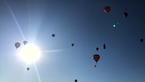 pan of the sky filled with hot air balloons