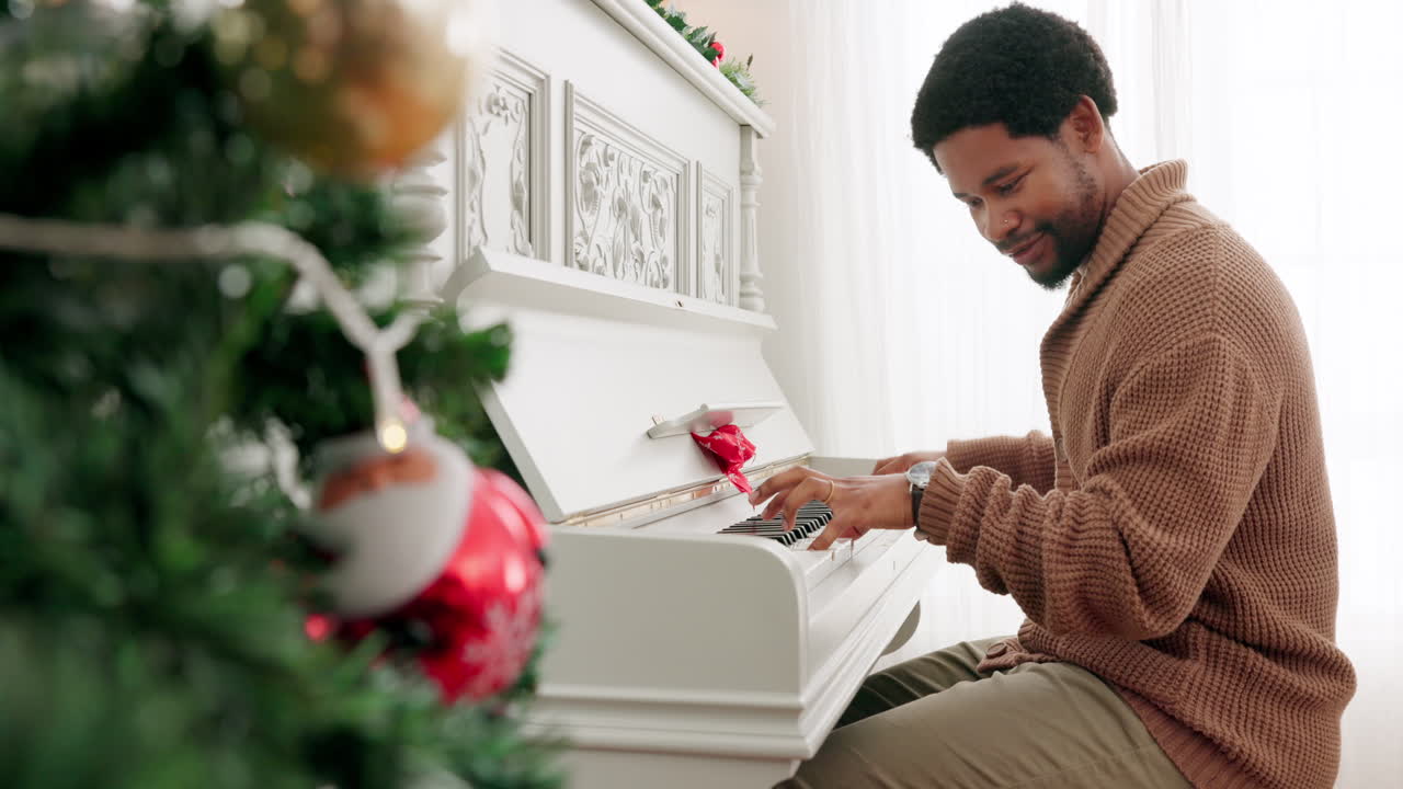 Christmas, home and black man play piano