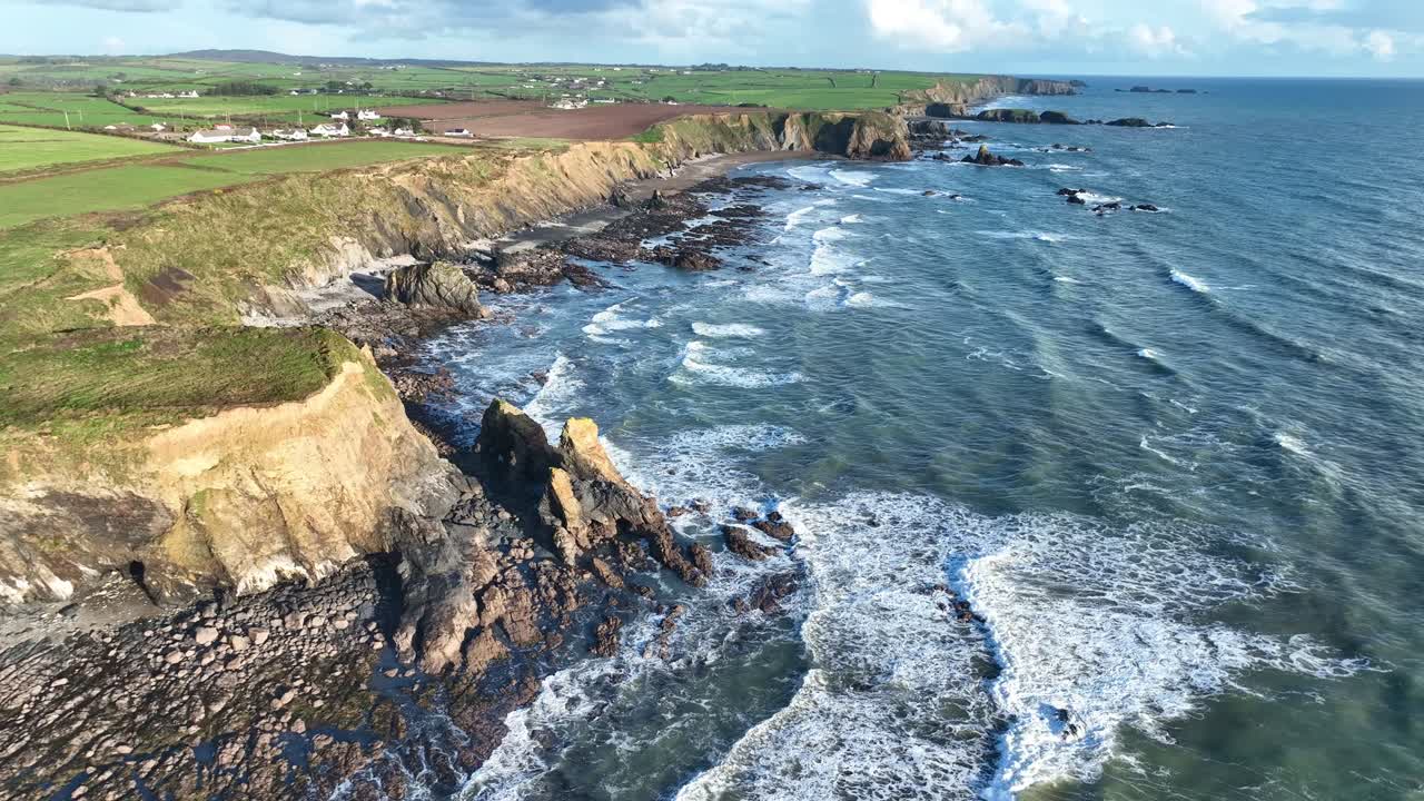 Irish Seascapes drone view of Copper Coast at Garrus Strand looking East wild beauty in Waterford